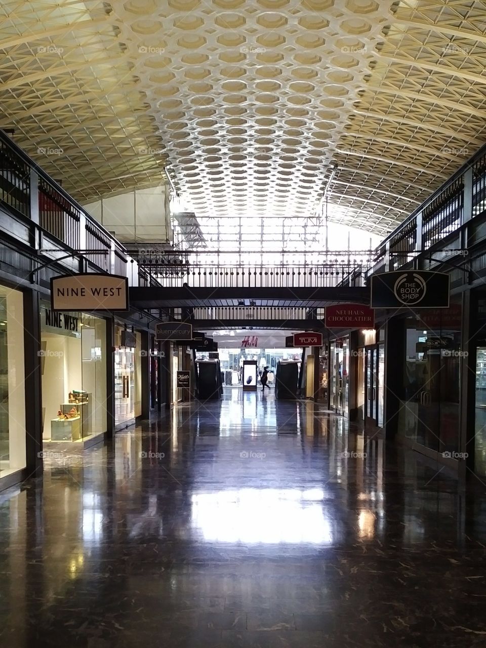 Before the Stores Open - Retail shops seen in a mall setting just before opening for business