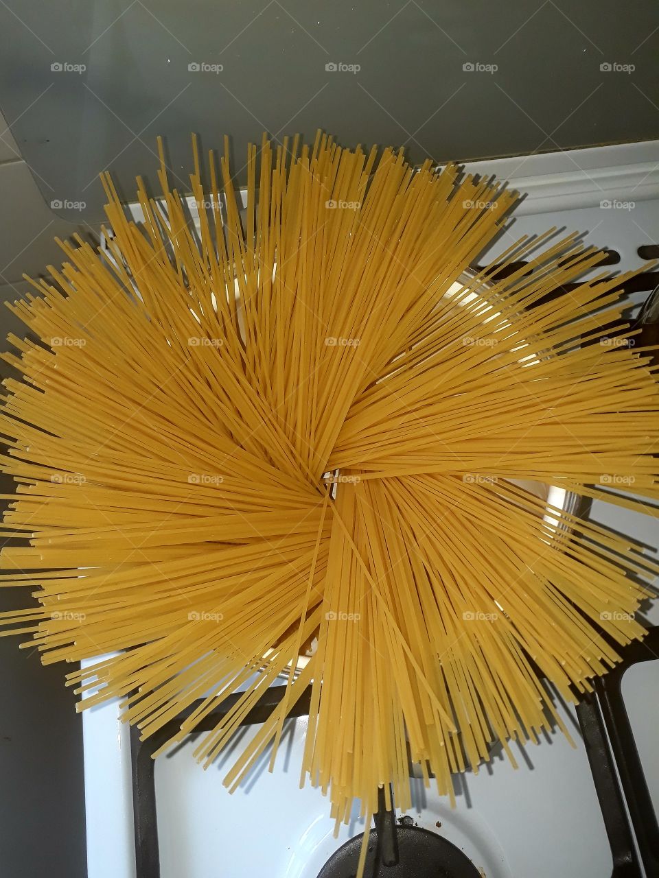 spaghetti in circles of pan