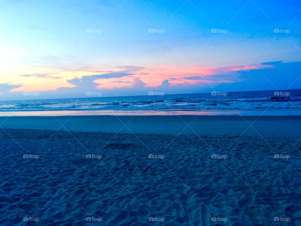 An early morning sunrise! I captured this photo while vacationing at Myrtle Beach, South Carolina. 