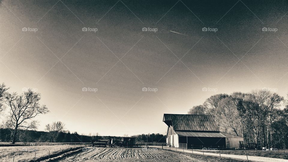 Vintage Barn . Ominous sky behind the barn. 