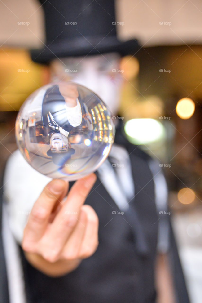 Magician with crystal ball