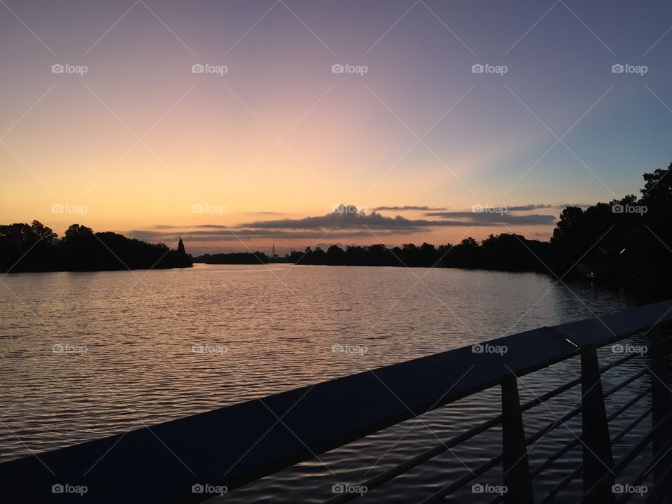 Lady Bird lake in Austin underneath an orange sky