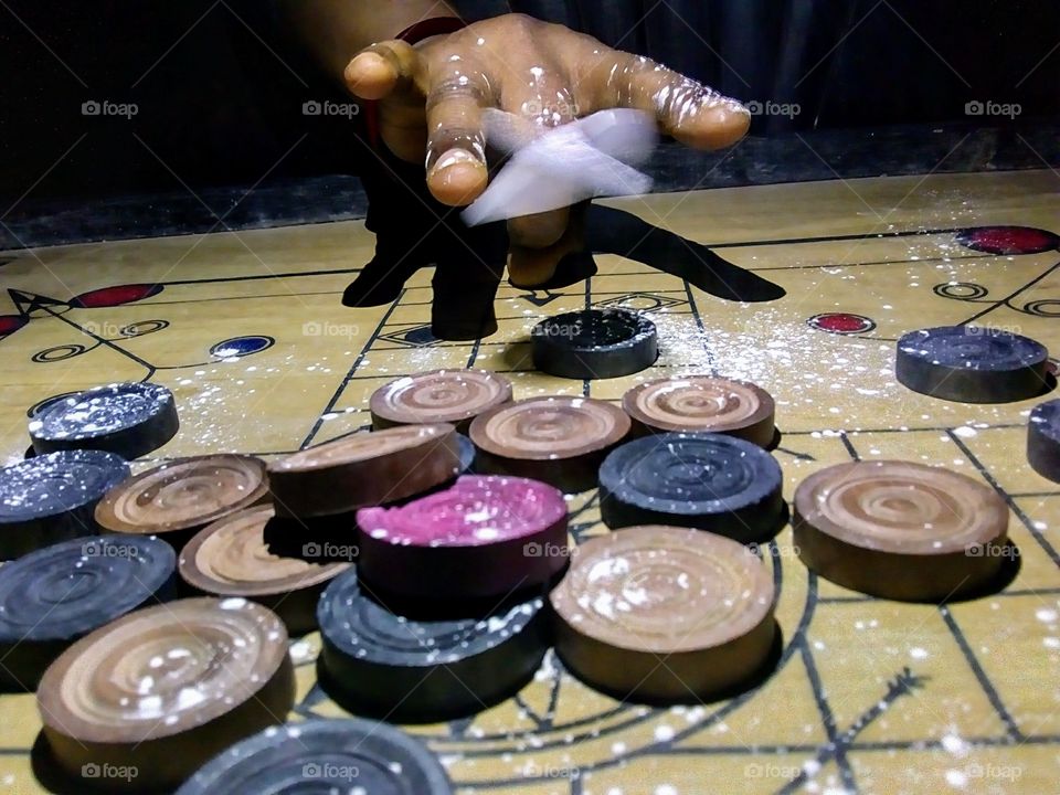 creating art with carrom board