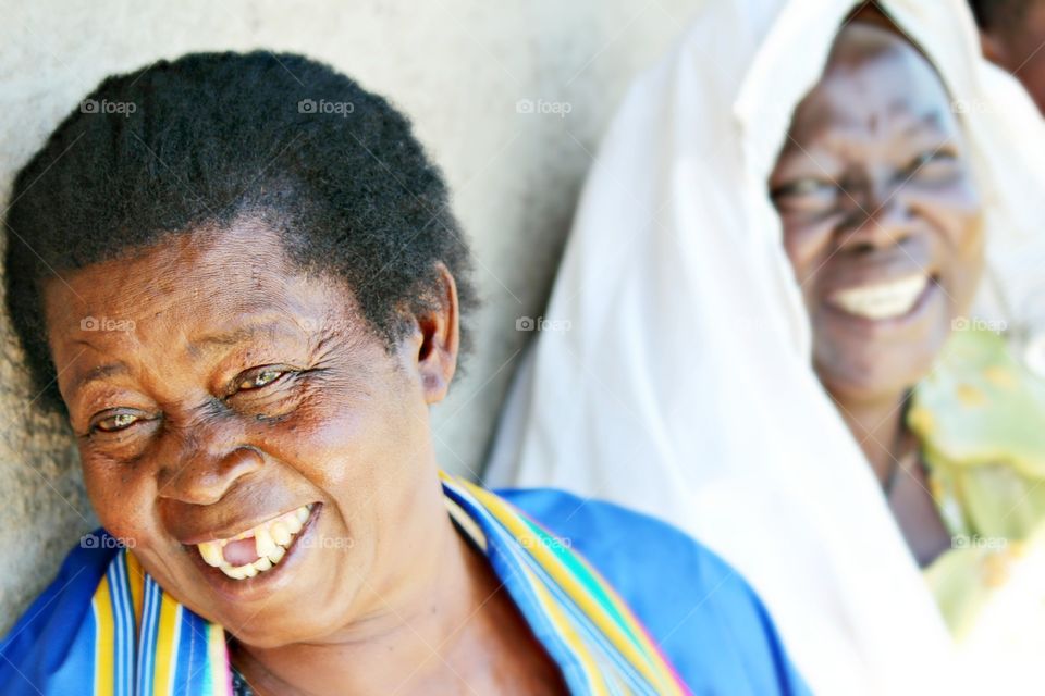 All smiles. I witnessed the most amazing thing. Everyone has stern and serious looks when I first took their photo... Then when I would show it to them, joy came bursting