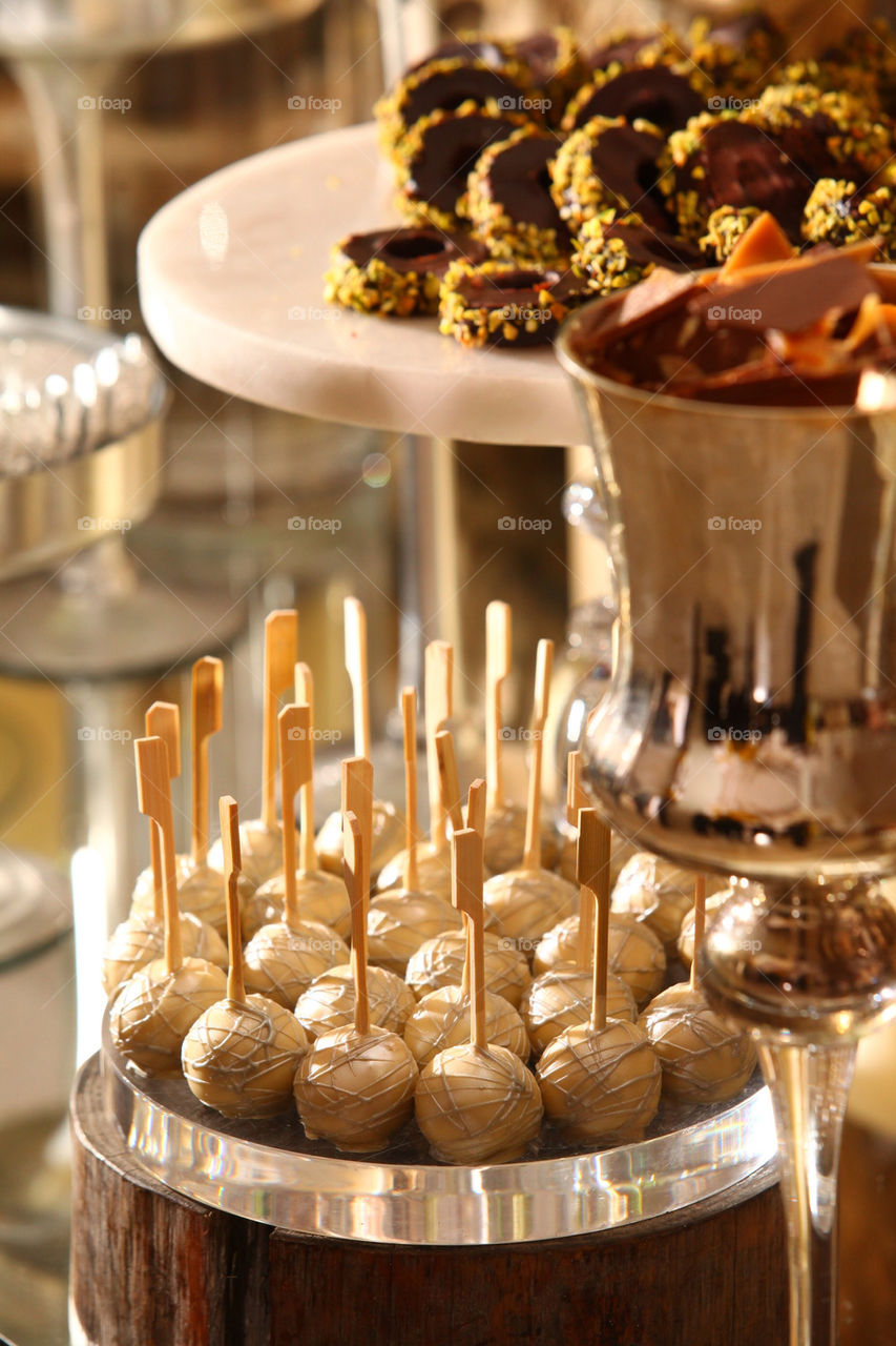 White chocolate covered Fudge and dough mini sweet pops