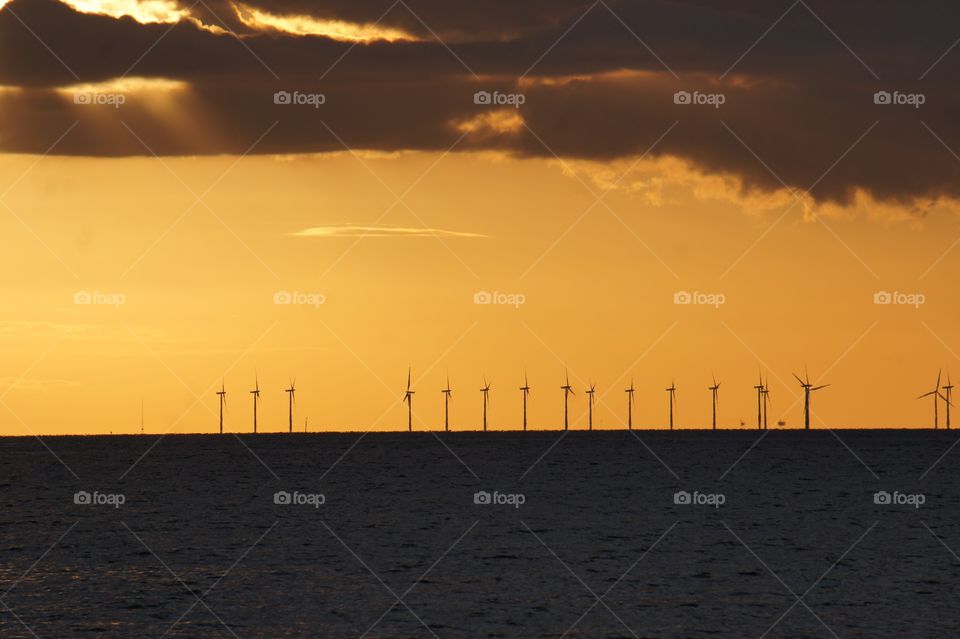 Windmills in sunset