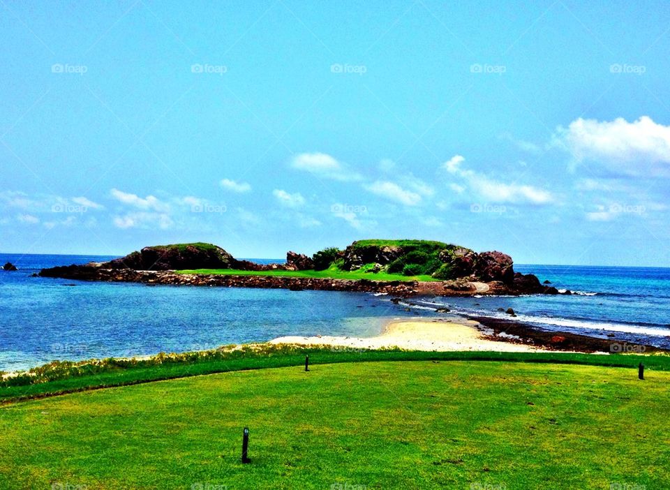 "Tail Of the Whale" Par 3. Only natural island green in the world.