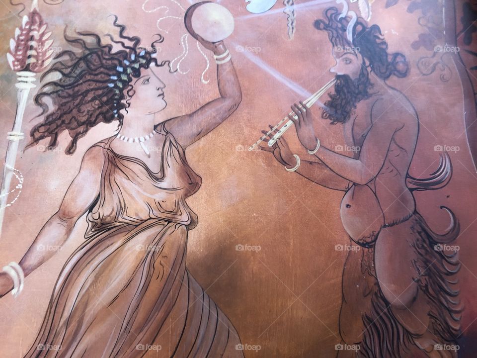 NI am not sure what this musician is trying to portray to his female companion, but it makes for an interesting photo.