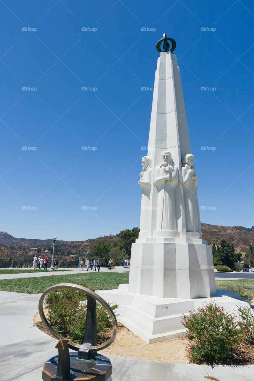 Four astronomers statues  in front of Griffith Observatory in Los Angeles 