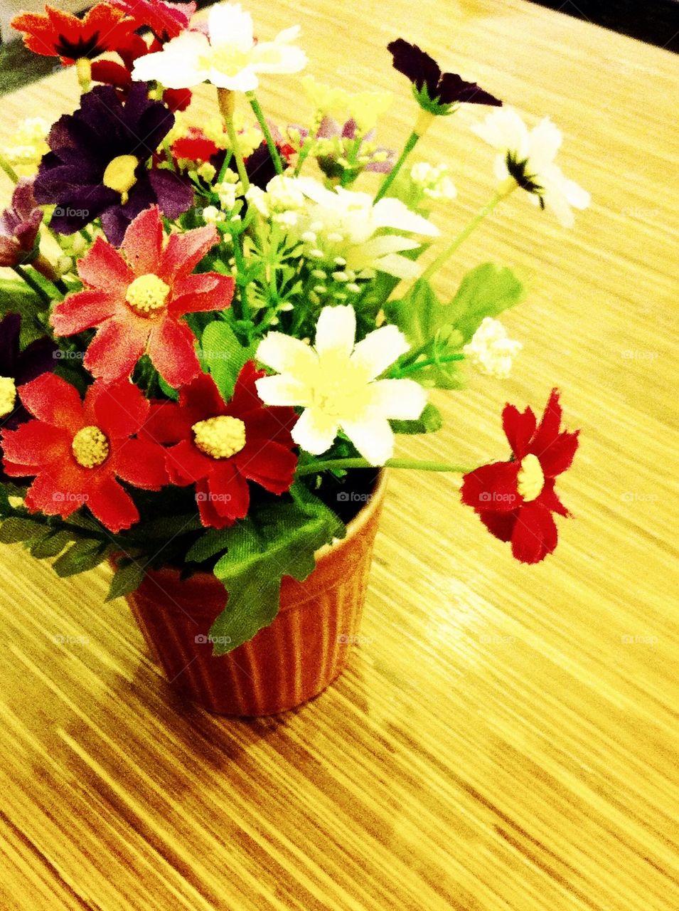 Artificial flower on the table
