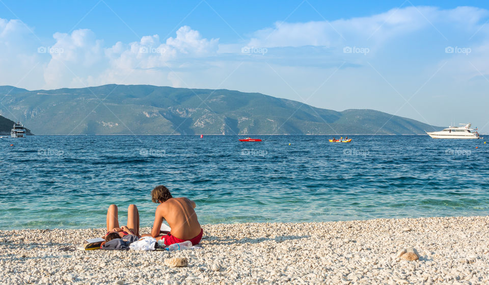 Two people at antisamos beach