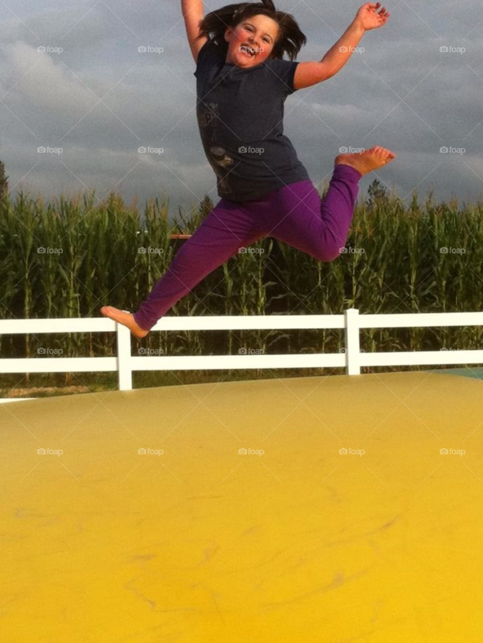 jumping posing bouncing corn field by sellershot