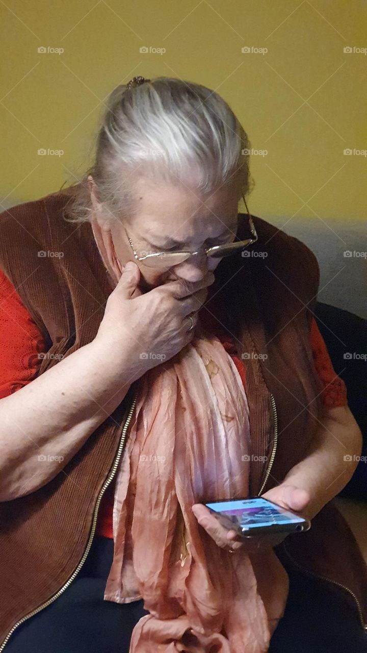 old woman and phone