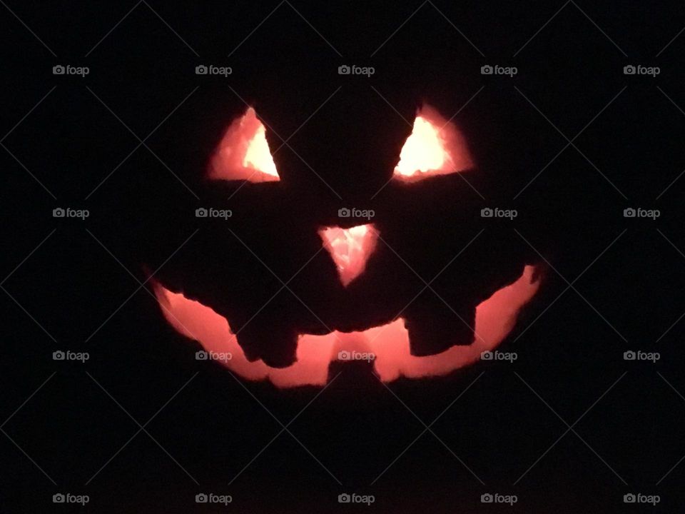 Menacing jack-o-lantern glows