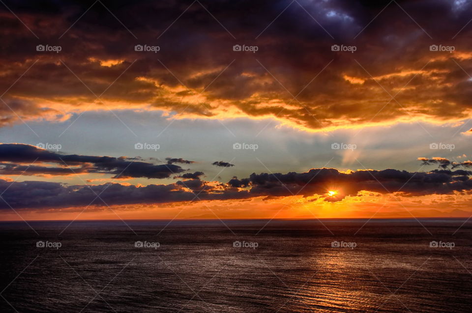 Scenics view of sea at sunset