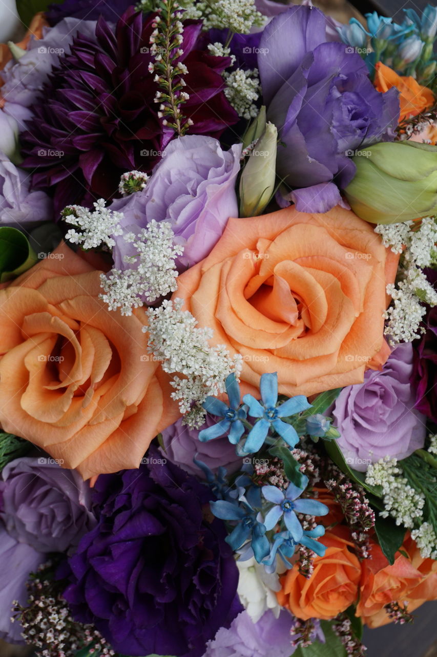 Violet, peach and blue flower bouquet