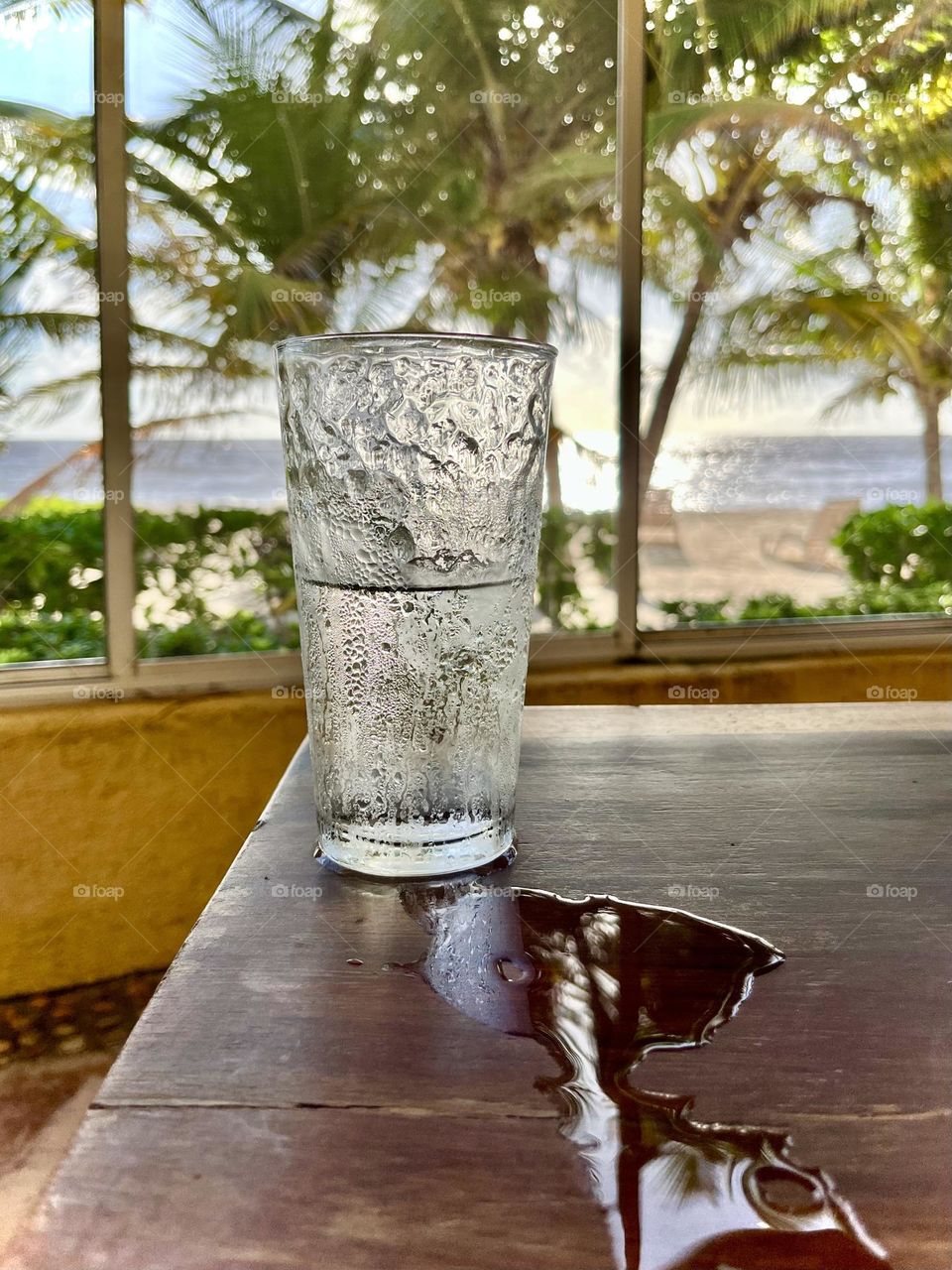 a glass of water on a hot day