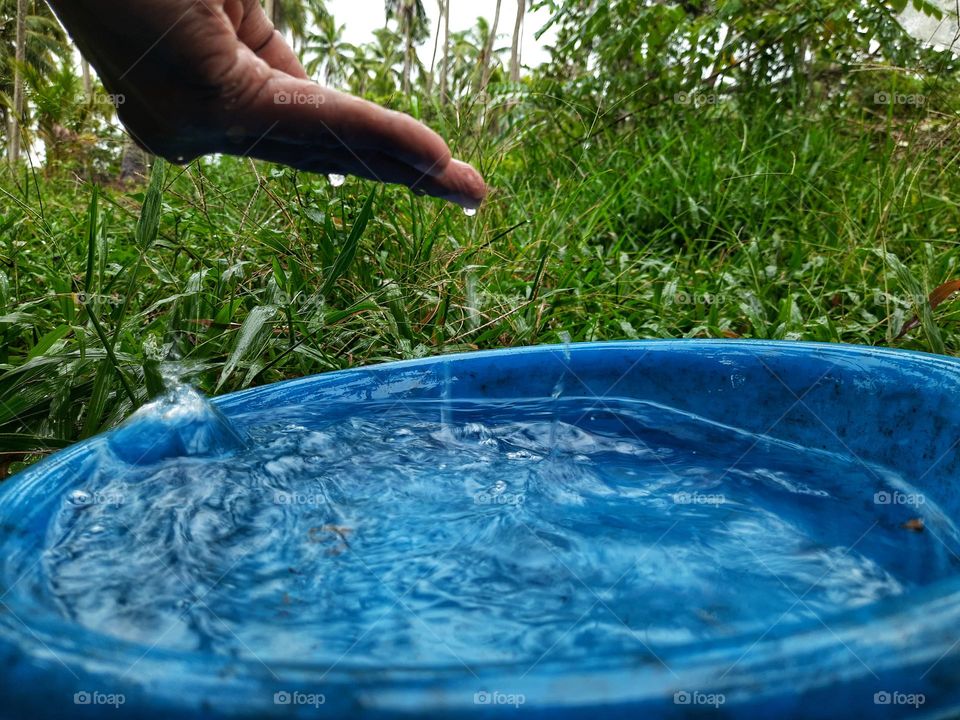 A bowl full of water on a rainy day