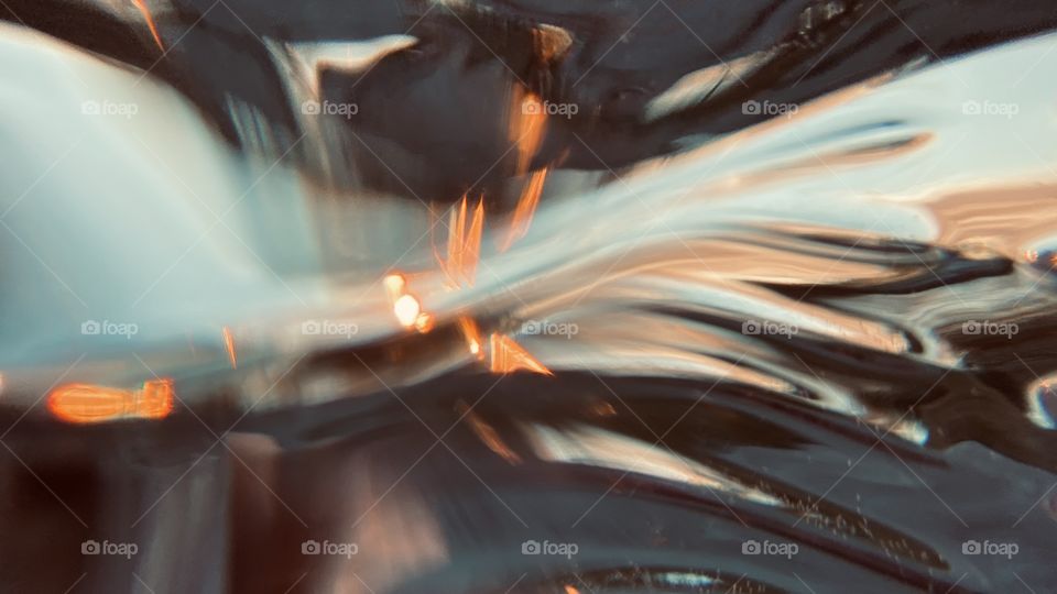 This what happens when the water bottle you are holding slips from your fingers while trying to take a sunset picture. 