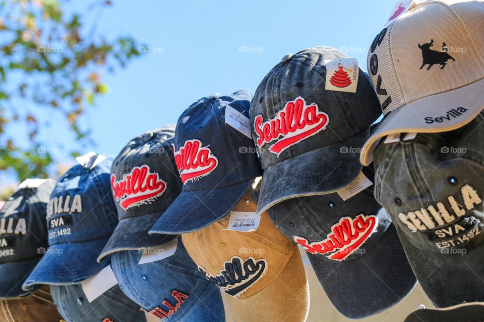 Travel to Sevilla, hats in a market