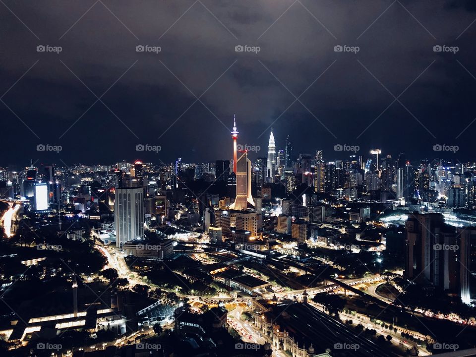 Kuala Lumpur skyline lights at night with kl tower, Maybank tower and Petronas twin towers KLCC 
