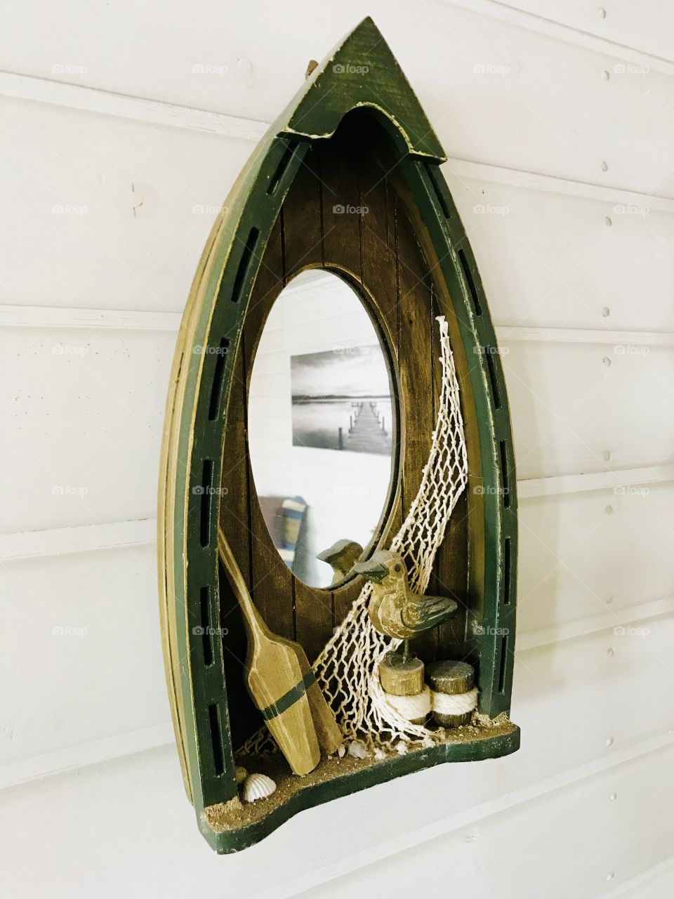 A nautical mirror on the wall 