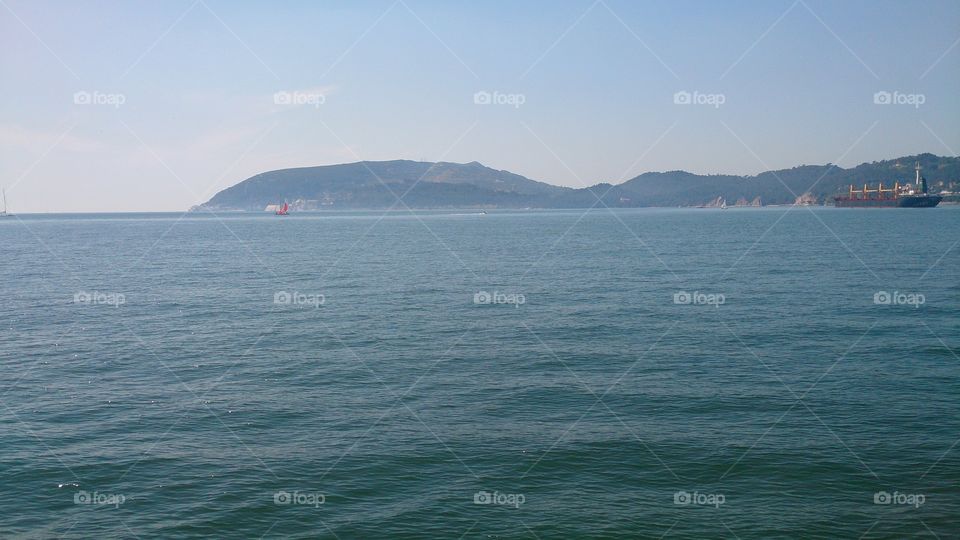 land and sea. the great mountain upon the great sea