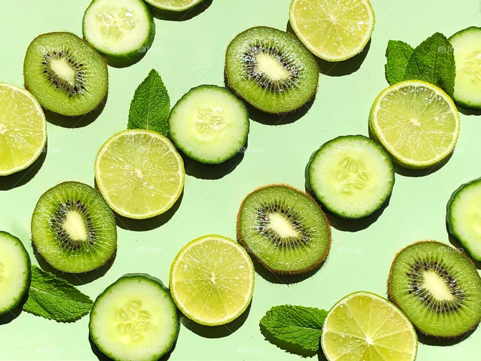 Green fruit and veg in rows