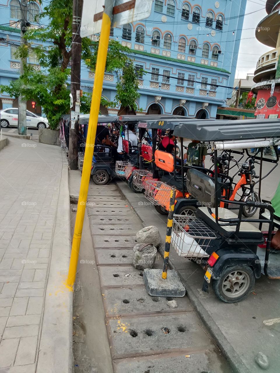 PARKING AREA FOR THE ELECTRONIC TRICYCLE INSIDE THE PUBLIC MARKET