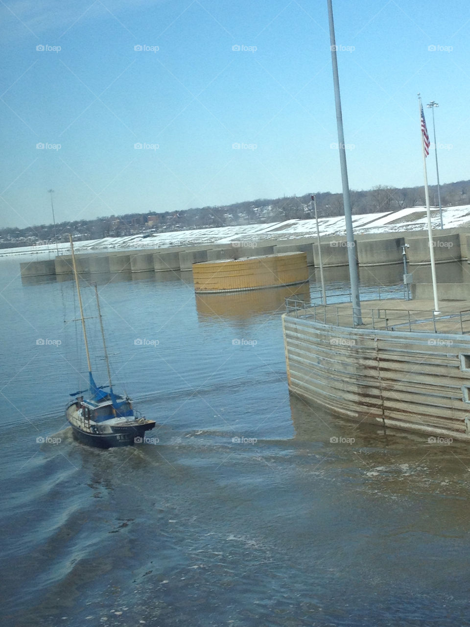 Sail boat going through the Locks and Dam on the Mississippi River at