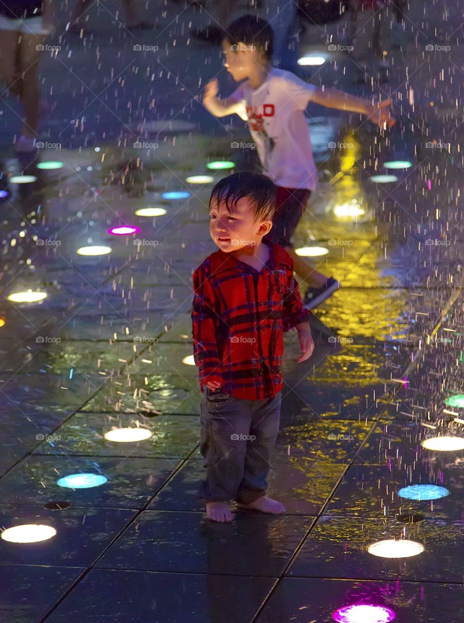 Enjoying the water fountain