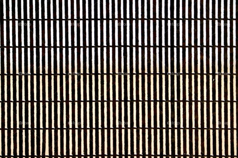 Metal door screen closeup textural background image 