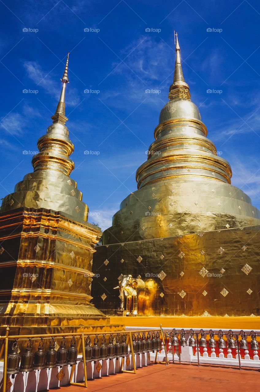 Beautiful golden stupas of Wat Phra Singh in Chiang Mai, Thailand 