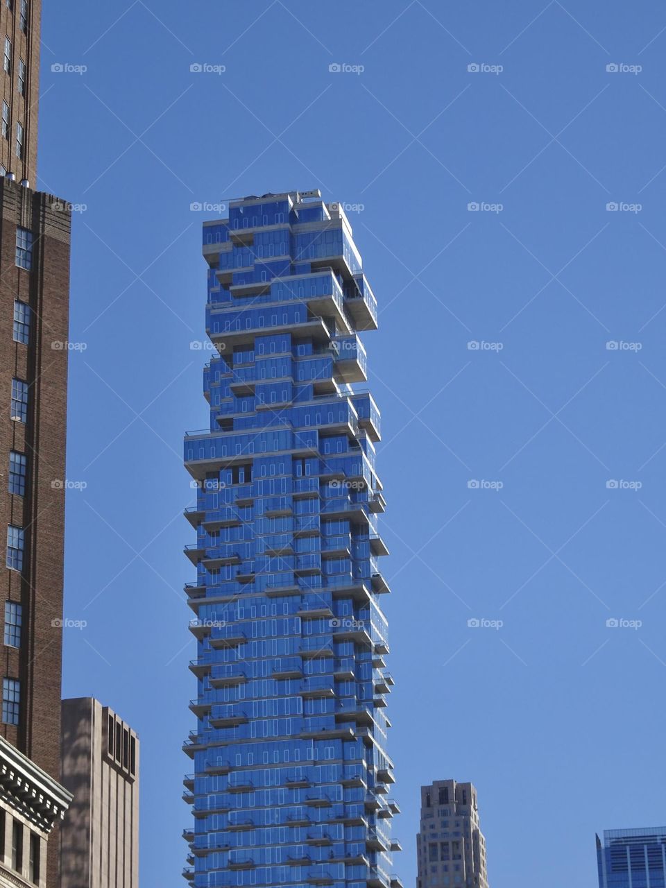 Tower block against blue sky