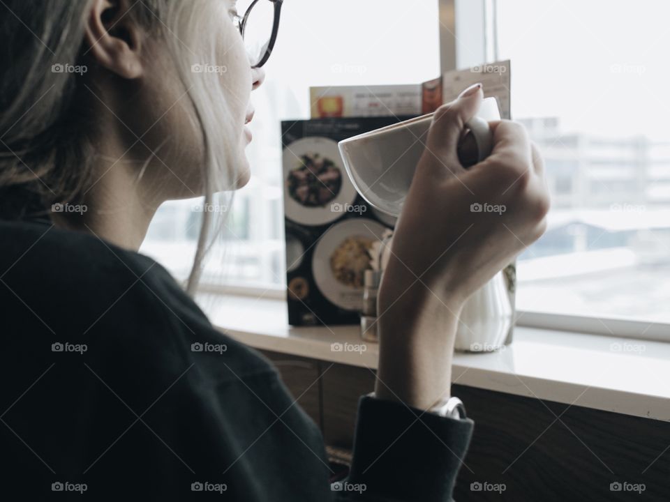 Girl drinking Coffee