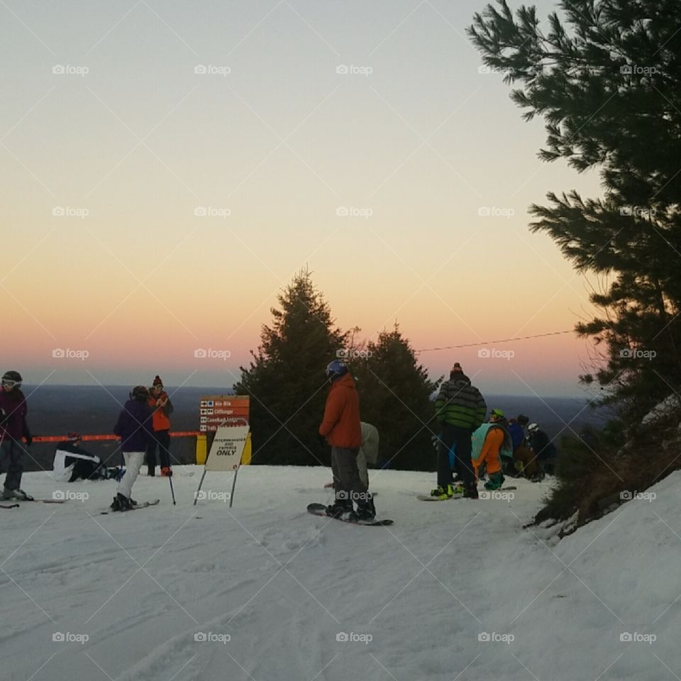 snowboarding at sunset