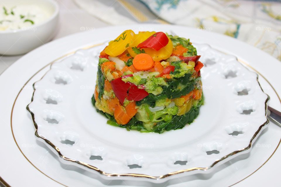 Boiled vegetables on a white plate
