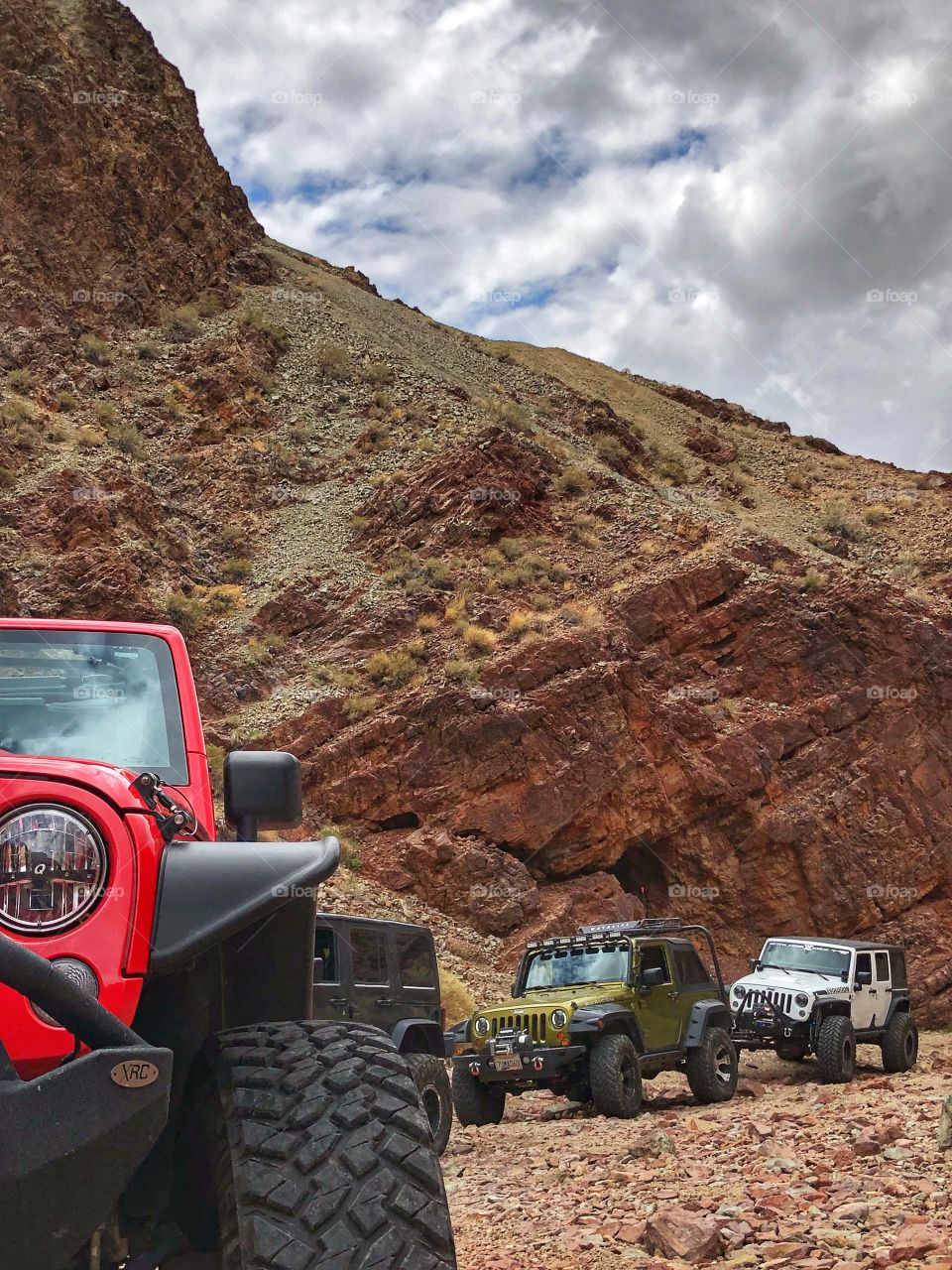 Line of jeeps from headlamp perspective 