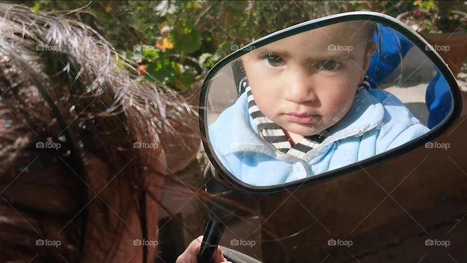 Mirror portrait of child