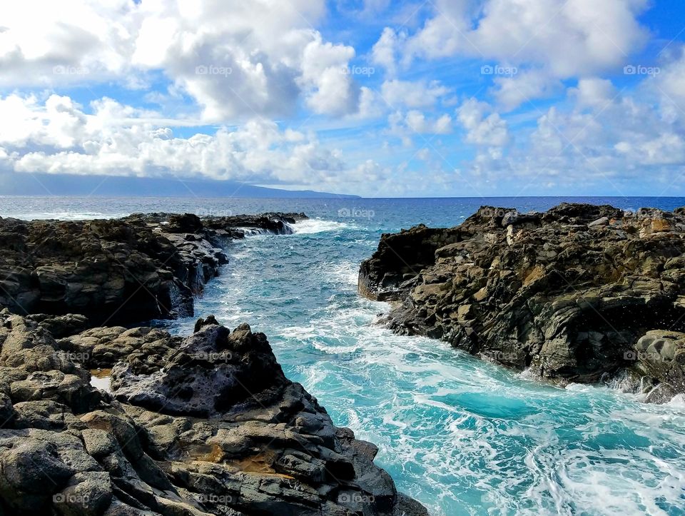 Cloudy sky over blue lagoon