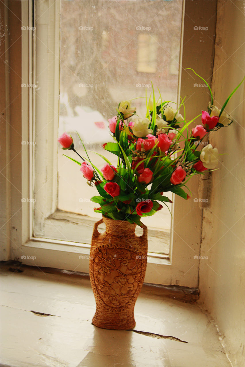 flowers on the old window