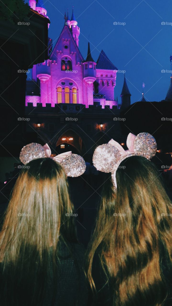 2 girls in the most magical place on earth, Disney land.