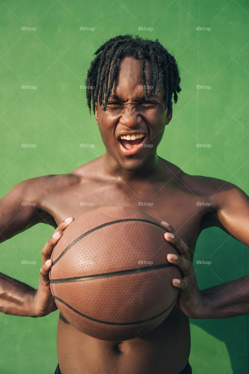 Man holding basketball