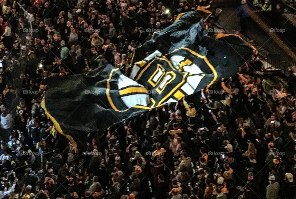 The Boston Bruins playoff banner makes its way around the Boston Garden.  What a great season it was! 