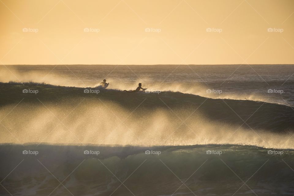 Trying to get out past the sets at banzai pipeline