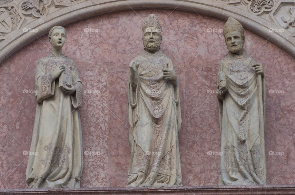 Marble figures over the Portale dei Priori, Perugia