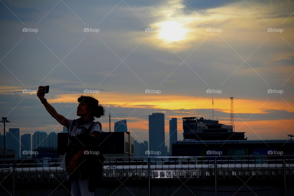 enjoy the sunset moment in Jakarta