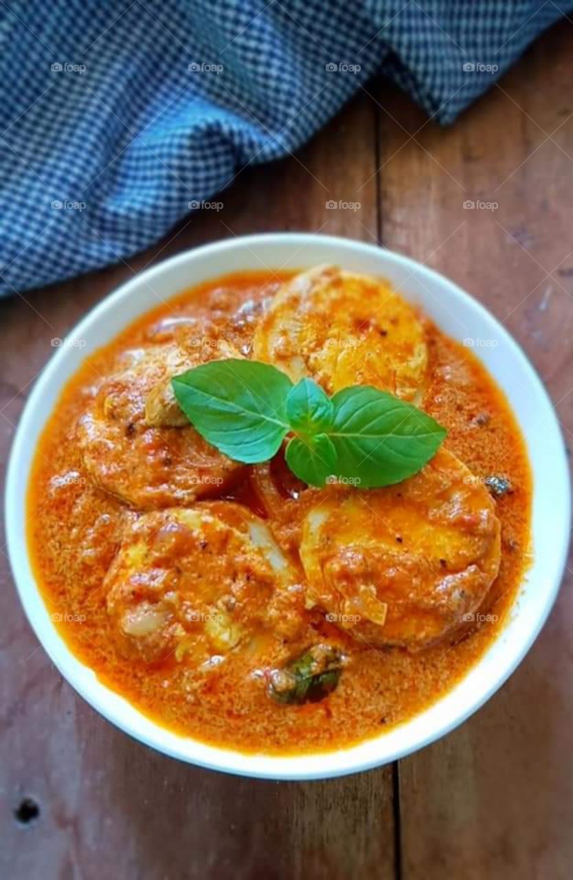 Sri Lankan style spicy egg curry .