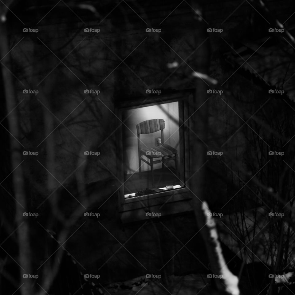 chair in corner, view from the outside.