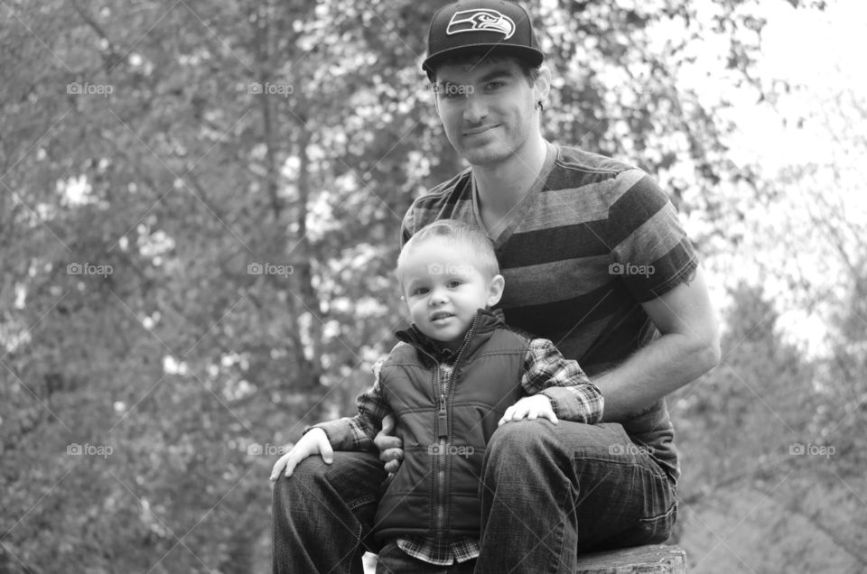 Just two boys taking a break from playing at the park
